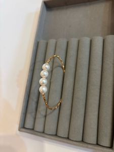 Elegant Pearl &amp; Gold Tone Cuff Bracelet
