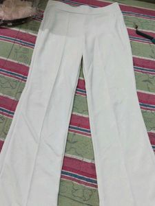 White Flared Trousers and red top