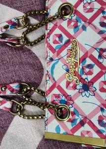 Chic Floral Handbag with Chain Straps