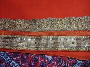 Elegant Orange Saree with Golden Border