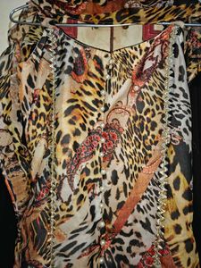 sleeveless leopard print kurta, sharara and dupatt