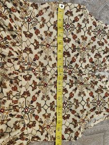Elegant Cream Kurti with Floral Embroidery