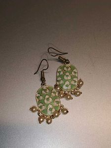 set of 3 hoops and a green meenakari earrings