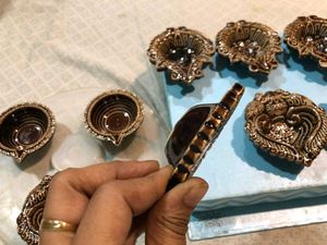 Set of New 9 ceramic designer diyas together.