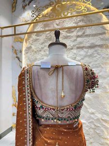 Elegant Brown Embellished Saree