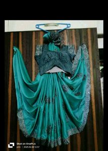 Stunning Teal Embellished Saree