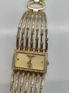 Elegant Gold Tone Watch with Rhinestones