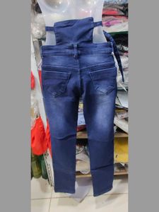 High Waist Ripped Jeans with Button upRings