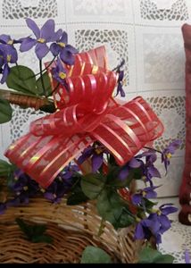 8. Wicker Basket with Purple Flowers