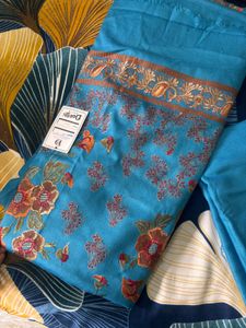 Beautiful Teal Embroidered Dress Material