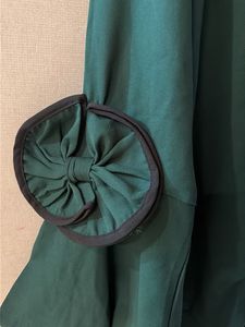 Elegant Green Top with Bow Detail
