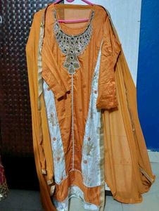 Orange Kurta Set with Embellished Neckline