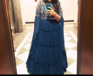 Elegant Teal Gown with Embellished Neckline