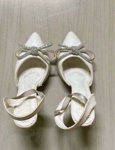 Chic White Heels with Bow Detail