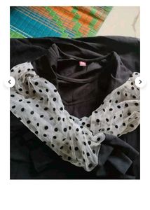 Chic Black Dress with Polka Dot Sleeves
