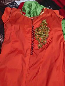Orange Ethnic Gown with Blue Floral Embroidery