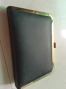 Elegant Black Clutch with Gold Trim