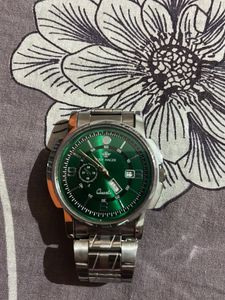 Green dial wrist watch