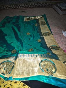 Elegant Teal & Gold Embroidered Saree