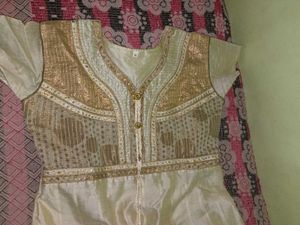 Elegant Cream Kurta Set with Gold Embellishments