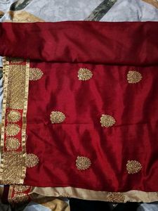 Elegant Red Saree with Golden Embroidery