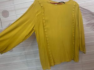 Mustard yellow casual top from Van Heusen