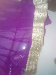 Elegant Purple Gown with Gold Embellishments