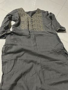 Elegant Grey Kurta with Intricate Gold Embroidery