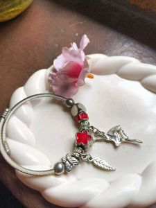 Charming Charm Bracelet with Red Accents