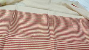 Cream saree with red border