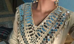 cowrie shells and mirror work kurta set