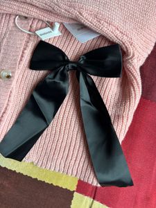 Pink Cardigan with Black Bow Accent
