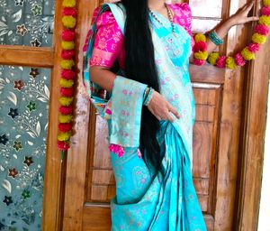 pink blouse blue saree