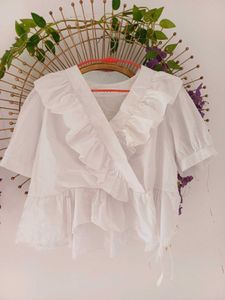 Elegant White Ruffled Peplum Top