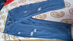 Distressed Blue Denim Jeans