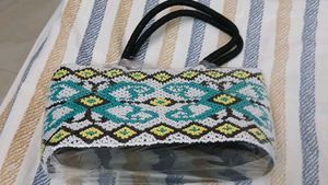 Exquisite Beaded Handbag with Geometric Pattern