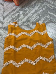 Yellow Embroidered Sleeveless kurti