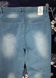 Ripped Light Wash Denim Jeans