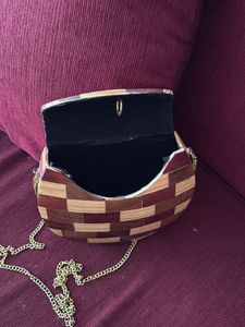 Wood sling bag