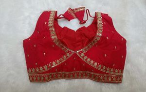 Sleeveless embroidered red blouse