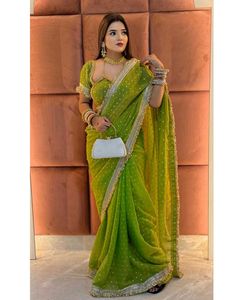 Elegant Green Saree with Silver Motifs