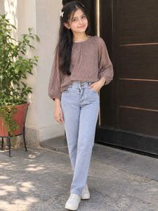 Sparkly Top & High-Waisted Jeans