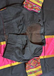 Elegant Black Saree with Pink Border