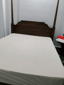 Elegant Four-Poster Bed Frame