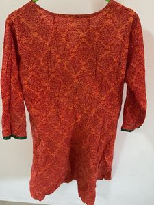 Orange Kurta with Green Neckline