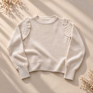 CREAM RIBBED KNIT SWEATER WITH RUFFLE SHOULDER