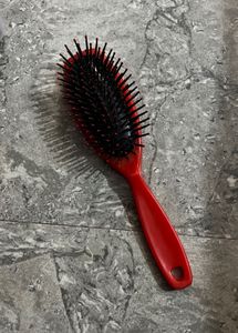 Red Oval Hair Brush