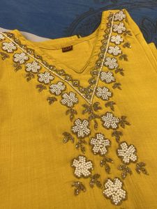 Exquisite Yellow Kurta with Intricate Beadwork