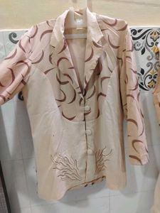 Stylish Beige Blazer with Unique Print