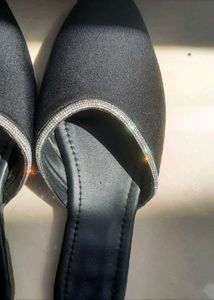 Stylish Black Mules with Embellished Trim